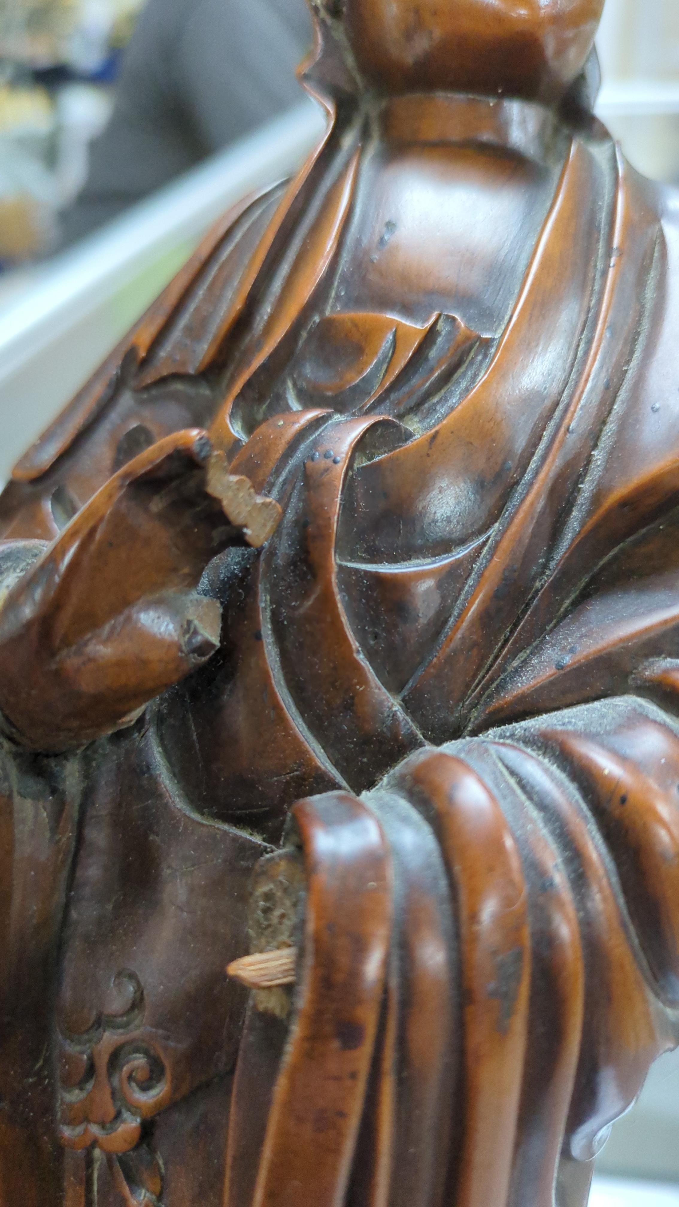 A Chinese carved boxwood figure of Guanyin, 19th century, 37cm high